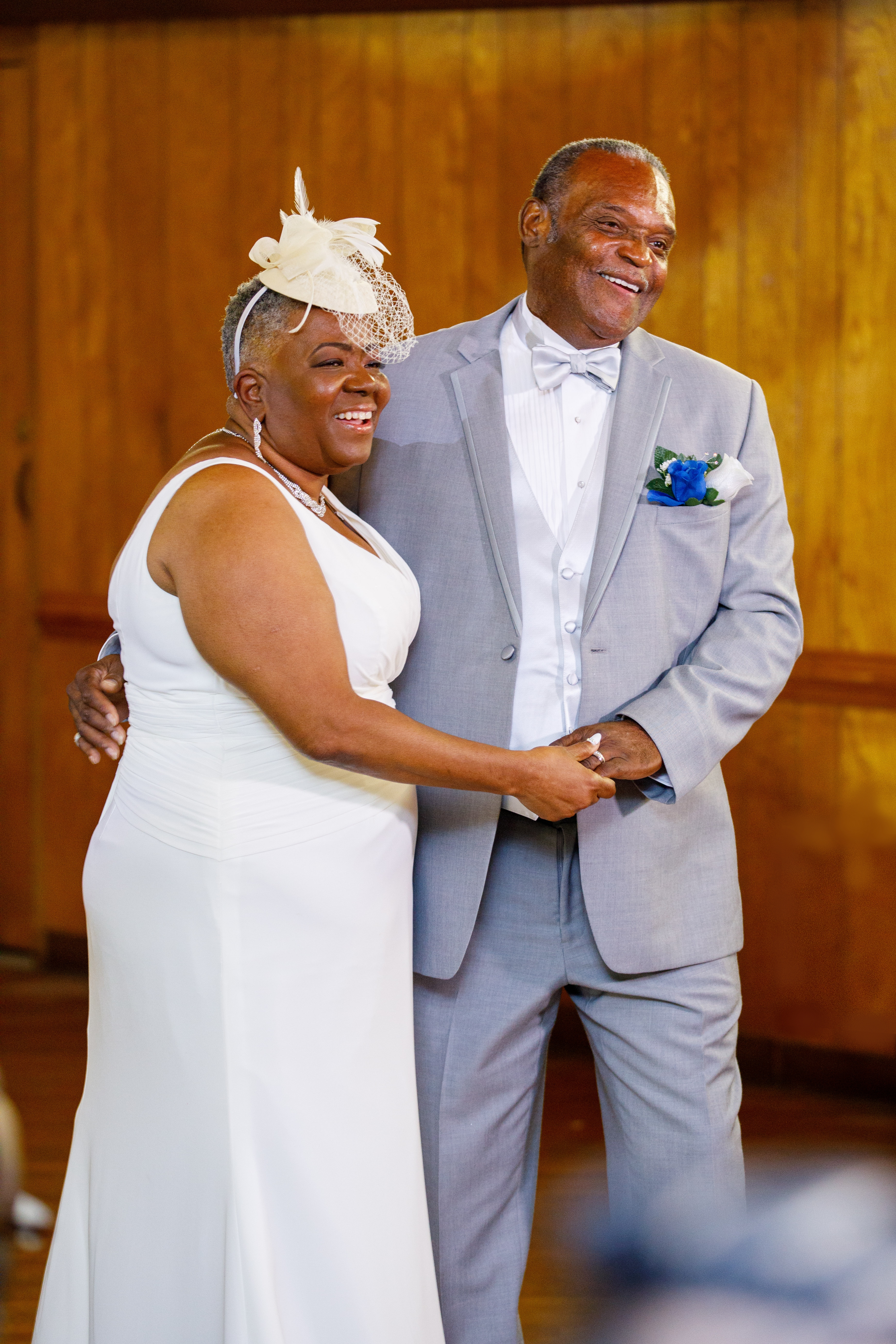 Couple smiling together during a formal portrait